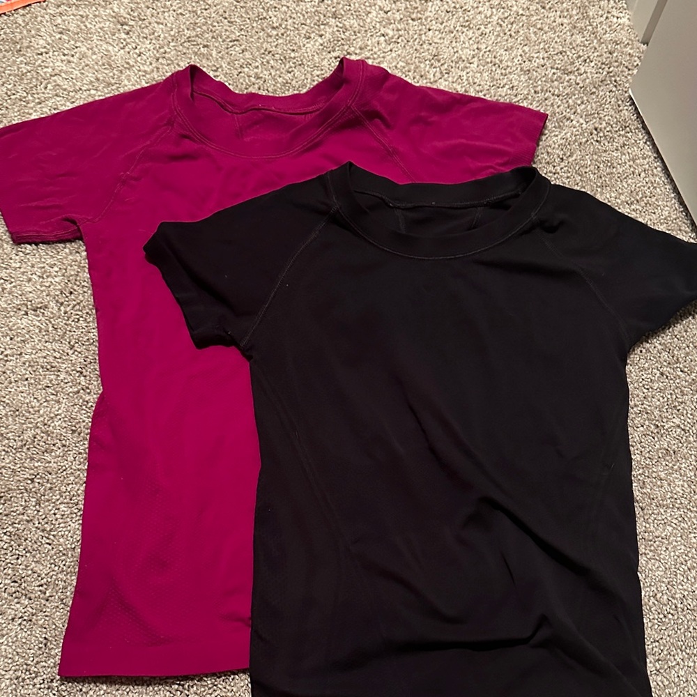 Athleta Momentum Seamless Black and Magenta tops